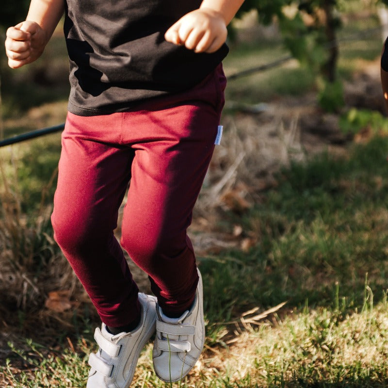 maroon rye pants with black tee on young boy or girls 