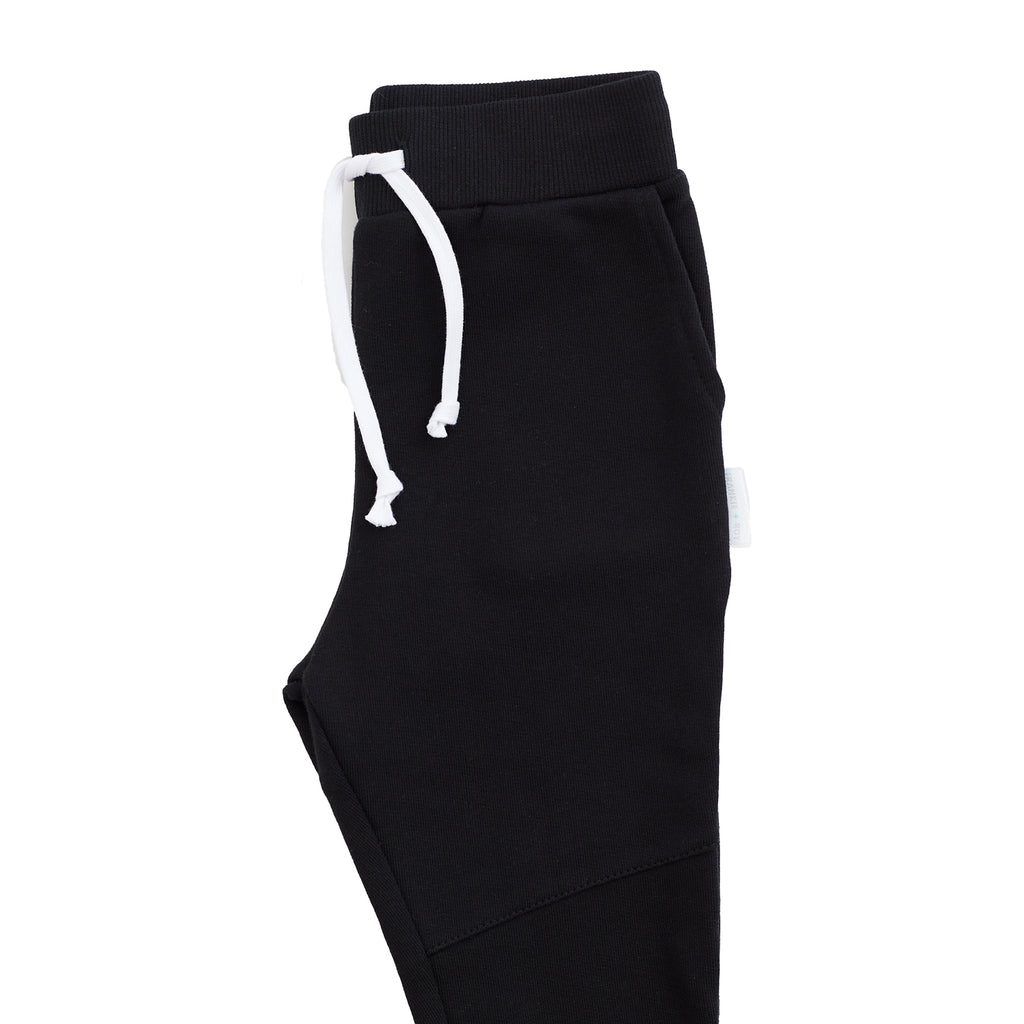Black Skinny & Slim trackies/ joggers for boys & girls. Made in Australia our pants are designed with a smaller waist without compromising on length. Best pants for skinny kids
